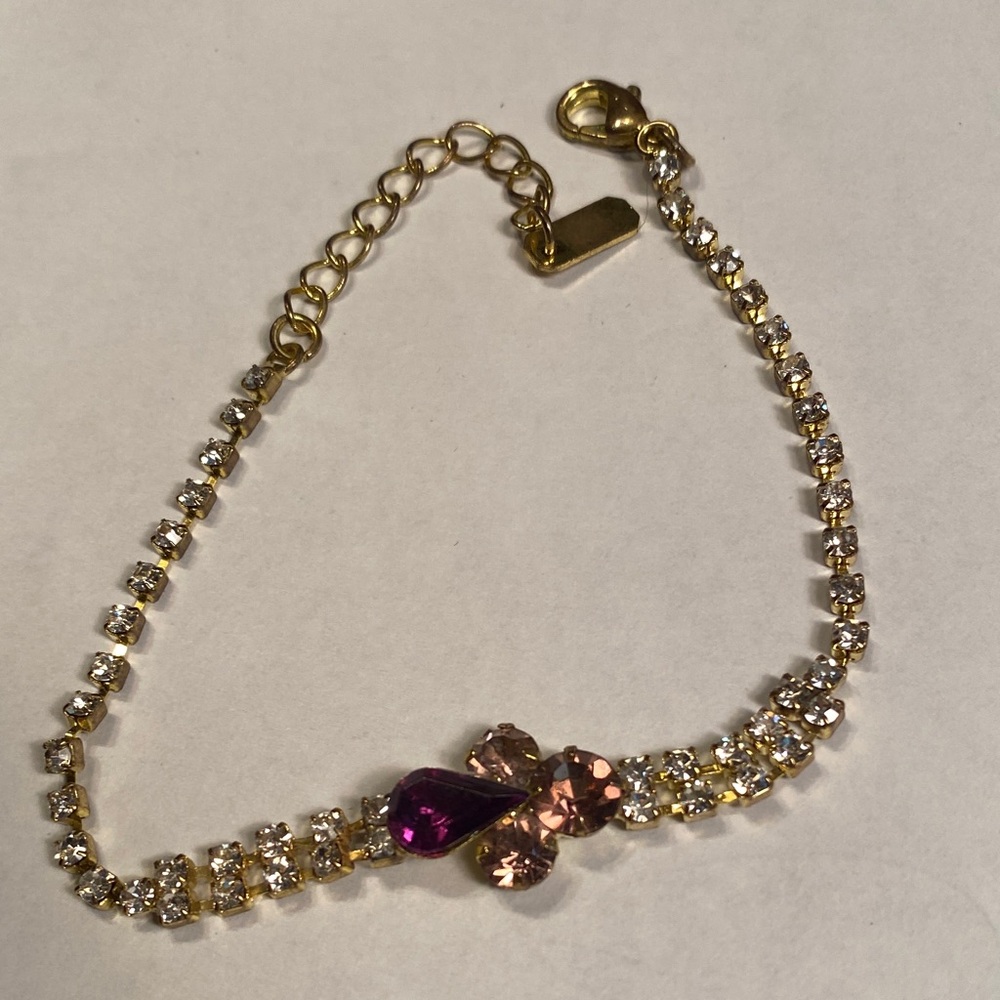 Gold-Tone Bracelet with Pink and Purple Crystal Accents